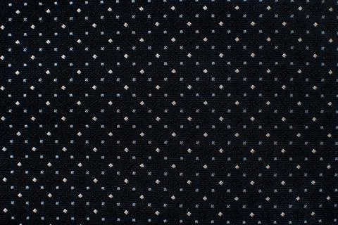 Background from fabric with a small pattern. Material for tailor, seamstress Stock Photos