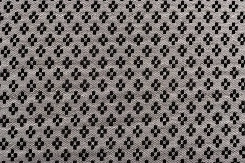 Background from fabric with a small pattern. Material for tailor, seamstress Stock Photos