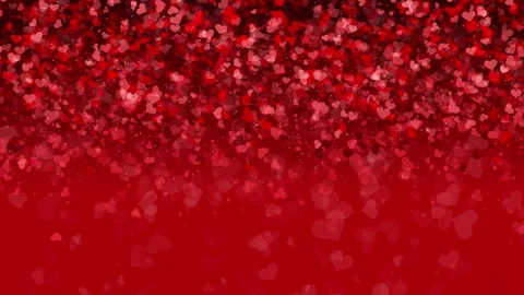 Background of falling small hearts with particle in red colors. Looped Stock Footage 263899125
