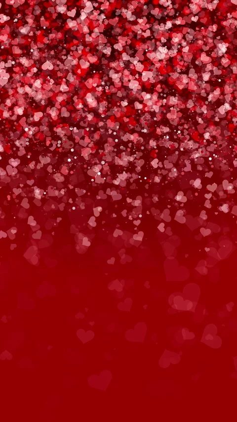 Background of falling small hearts with particle in red colors. Looped Stock Footage 301056859
