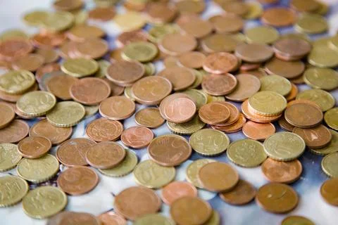 A background filled with small euro cent coins Foto stock