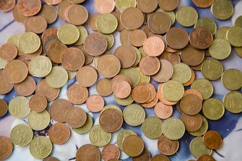 A background filled with small euro cent coins Stock Photos