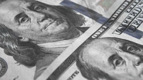 Background for a financial program or a blog on the Internet. A row of new 100 U Stock Footage 232993007