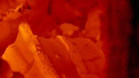 Background from a fire, conflagrant firewoods and coals Stock Photos