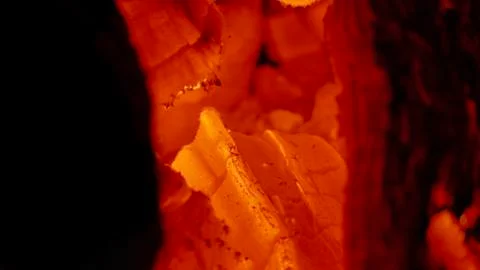 Background from a fire, conflagrant firewoods and coals Stock Photos