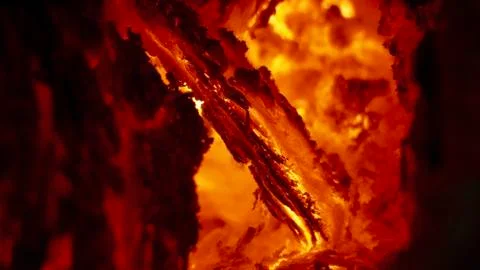 Background from a fire, conflagrant firewoods and coals Stock Photos