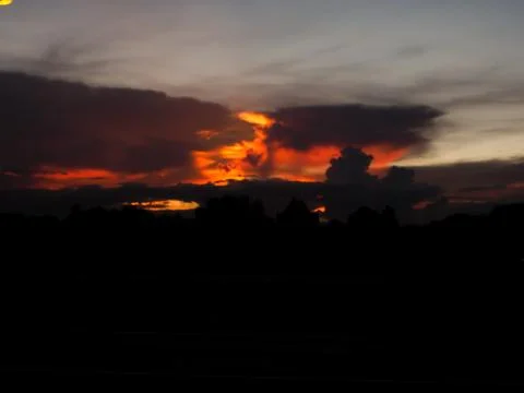 Background of the fire sky orange and dark black overall area dangerous bac.. Stock Photos