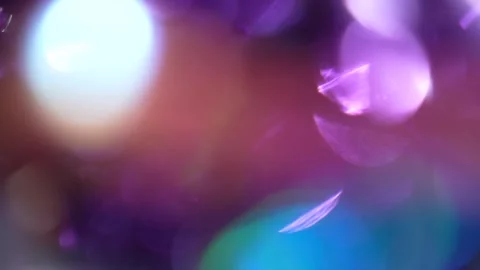 Background of fixed bokeh and overlay of colorful sparkling moving bokeh lights Stock Footage 315314989