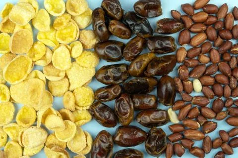 Background of flakes, dates, and nuts Foto stock