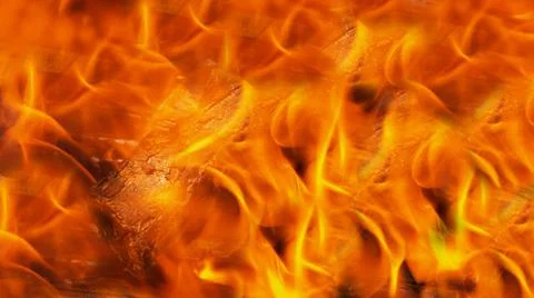 Background flames of fire orange, bonfire with wood Stock Photos
