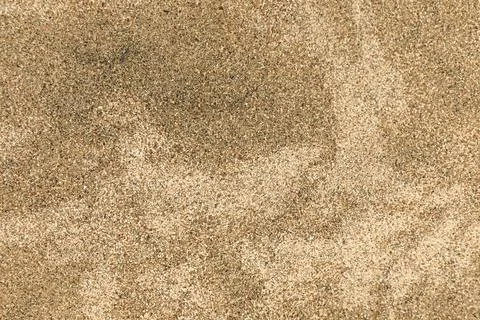 Background of flat damp sand Stock Photos