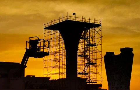Background of a flyover bridge construction site in qatar during sunset. Stock Photos