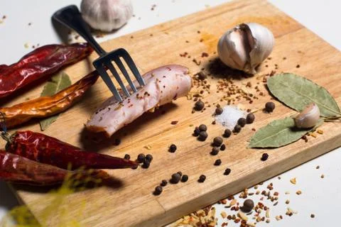 Background Fork with a slice of bacon Stock Photos