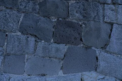Background in the form of a concrete structure of large stones Stock Photos