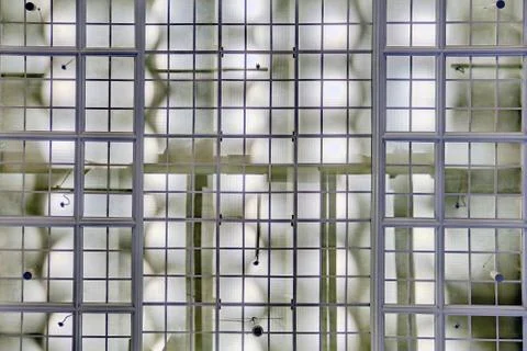 Background in the form of a glass ceiling, technical design in an industrial  Foto stock