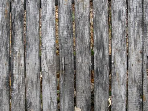 Background in the form of old boards of a rustic hedge.  Stock Photos