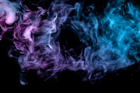 Background in the form of a pattern of colored blue and pink smoke in the sha Foto stock