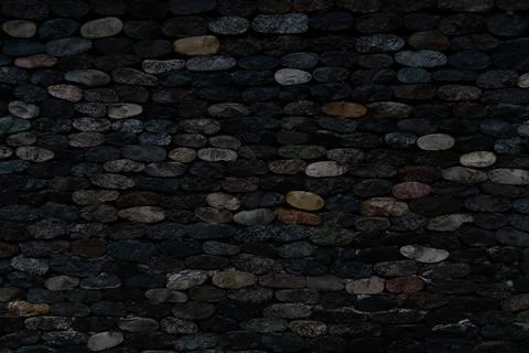 Background in the form of a textured dark stone wall Stock Photos