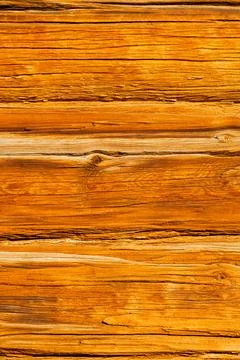 Background in the form of a wall made of old wood, vertical photo Stock Photos