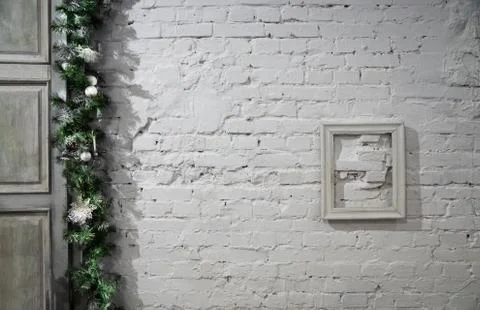 Background in the form of a white brick wall with frame on it Stock-Fotos