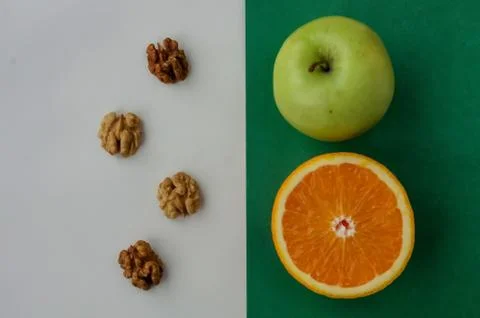 Background of fresh sliced fruit on a table in the afterno Stock Photos