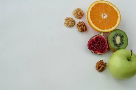 Background of fresh sliced ââfruit on a table in the afterno Stock Photos