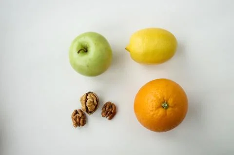 Background of fresh sliced fruit on a table in the afterno Stock Photos