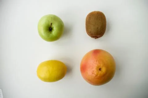 Background of fresh sliced ââfruit on a table in the afterno Stock Photos