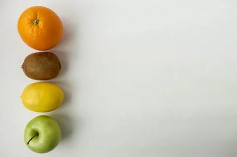 Background of fresh sliced fruit on a table in the afterno Stock Photos