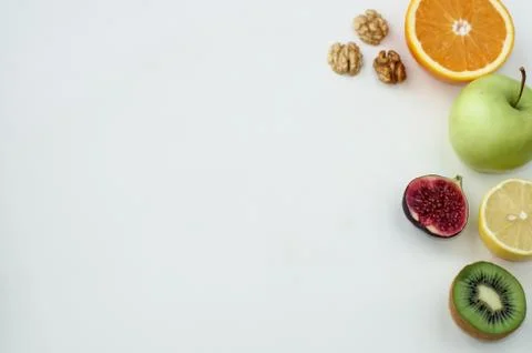 Background of fresh sliced fruit on a table in the afterno Stock Photos