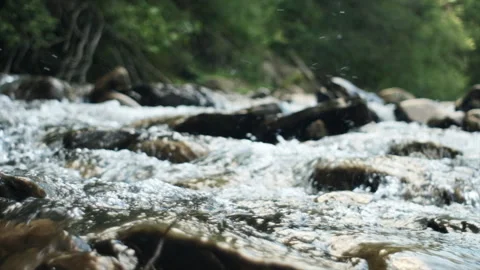 Background of fresh water with fast rapids in wild river Stock Footage 284336416