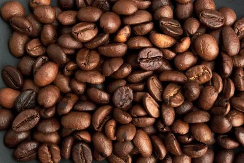 Background of fried coffee beans. Stock Photos