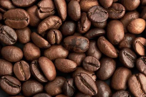 Background of fried coffee beans. Stock Photos