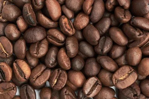 Background of fried coffee beans. Stock Photos