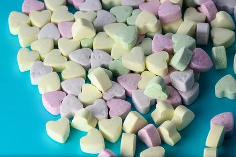 Background full of sweets in the shape of a heart. Valentine's Day concept Stock Photos