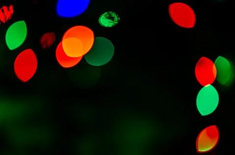 Background full of unfocused colored lights. Blurred traces of lights and s.. Foto stock