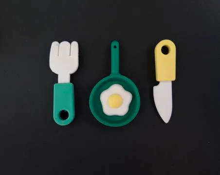 Background with funny fork, knife and scrambled eggs Stock Photos