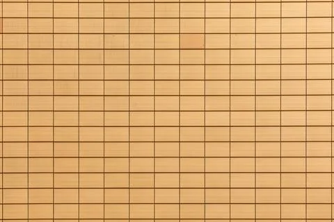 Background of geometric orange pattern in structured order 库存照片