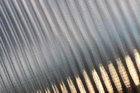 Background glare through the surface a variety of complex geometric patter... Stock Photos