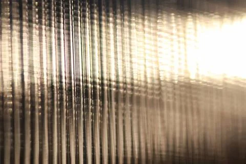 Background glare through the surface a variety of complex geometric patter... Stock Photos