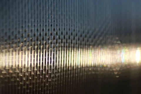 Background glare through the surface a variety of complex geometric patter... Stock Photos