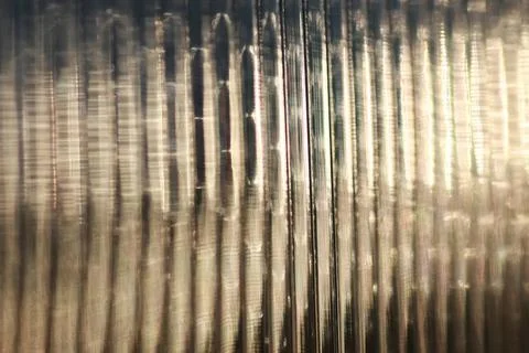 Background glare through the surface a variety of complex geometric patter... Stock Photos