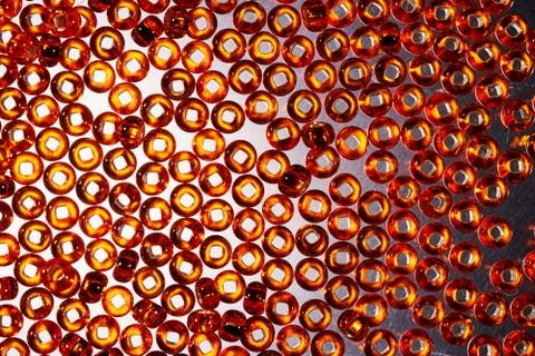 Background of glass beads for needlework. Macro shooting Stock-Fotos