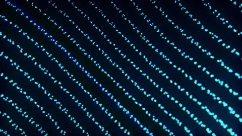 Background with glowing blue particles on a black screen. Stock Footage 249363596