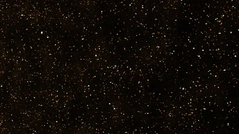 Background gold dust on black background… | Stock Video | Pond5
