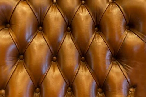 The background of gold leather sofa Stock Photos