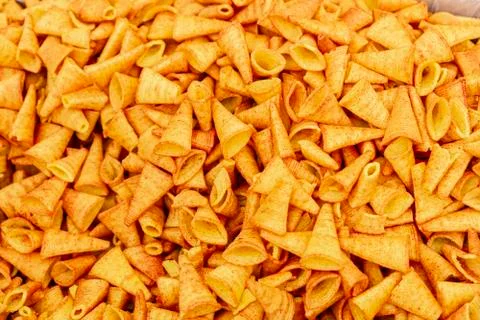 Background golden chips with texture Stock Photos