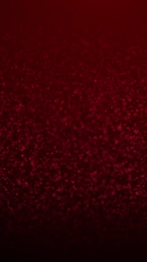 Background of golden shining red particles floating. 4K Vertical. Christmas.. Video stock 325138497