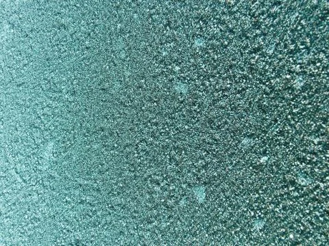The background is a gradient of green tide and white grainy frost and snow. W Stock Photos