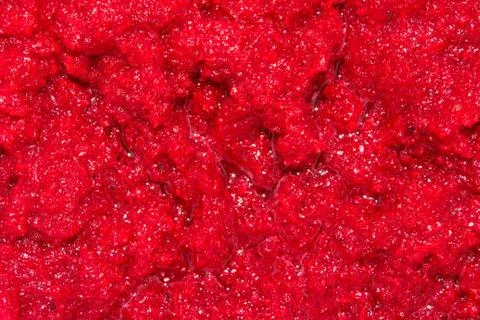 Background of grated beetroot.Beets ground in a blender. Stock Photos